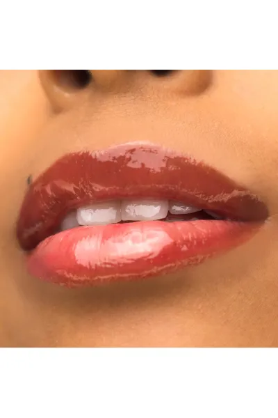  تصویر 1 : برق لب حجم‌دهنده Instant Plump Your Pucker Wild West قهوه‌ای کاراملی براق دبالم The balm 