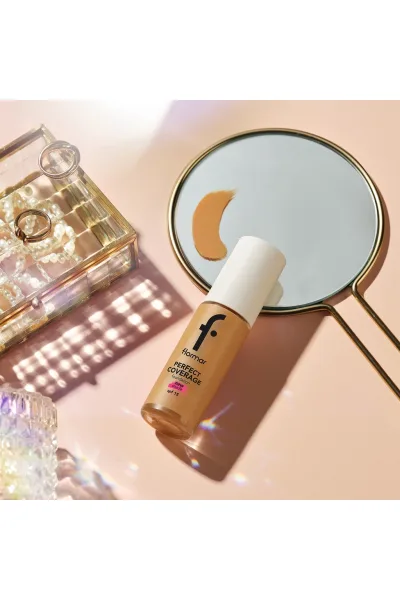  تصویر 5 : کرم پودر با پوشانندگی بالا و ماندگار SPF15 رنگ Light Ivory عاجی روشن Perfect Coverage Highly Pigmented Long Lasting SPF15 Foundation 100 Light Ivory فلورمار Flormar 